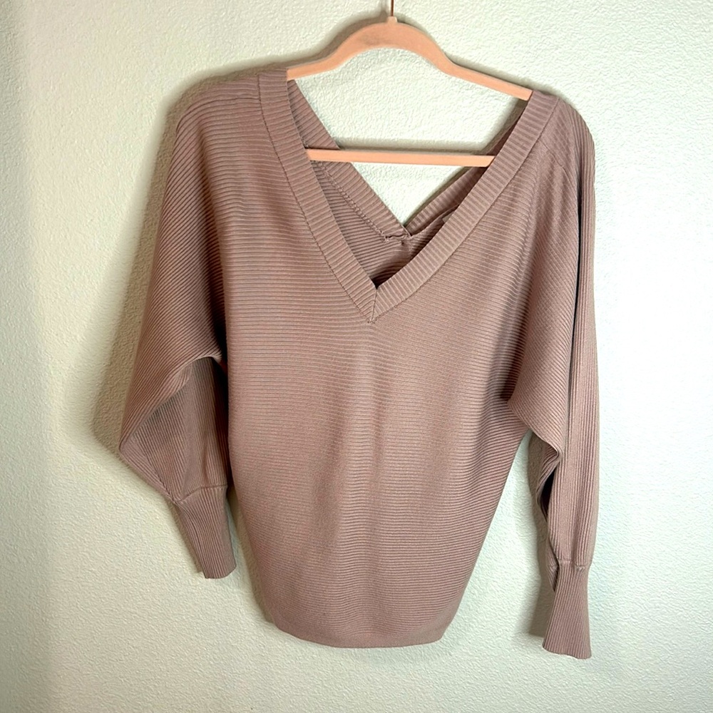 Beautiful rose, colored off the shoulder sweater with buttons in the back